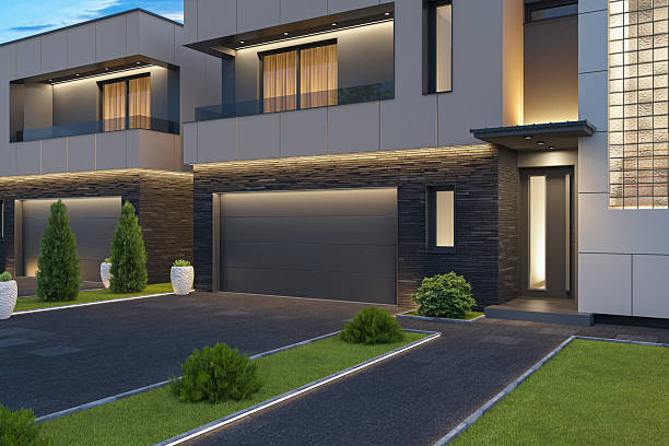 istock Modern Duplex Villa with Symmetrical Design and Evening Lighting 2242664633