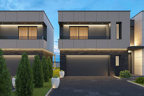 istock Modern Duplex Villa with Symmetrical Design and Evening Lighting 2242664636