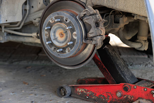 istock Mechanic changing a wheel of a modern car 2242667297