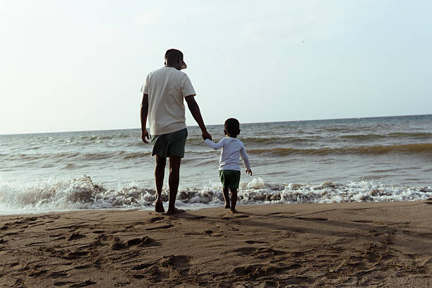 Shot of a father and son enjoying a day outdoors