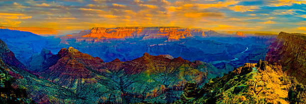 The photos for this panoramic image were taken in the early morning in the springtime at the south rim of Grand Canyon National Park. Springtime is a great time to visit the park. There are more colors displayed after the winters snow have melted. Creating even more contrasts.