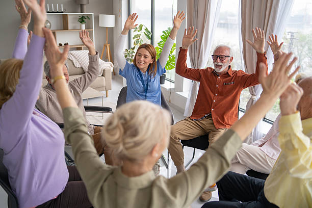 istock Supportive moment with caregiver assisting a senior 2242680108