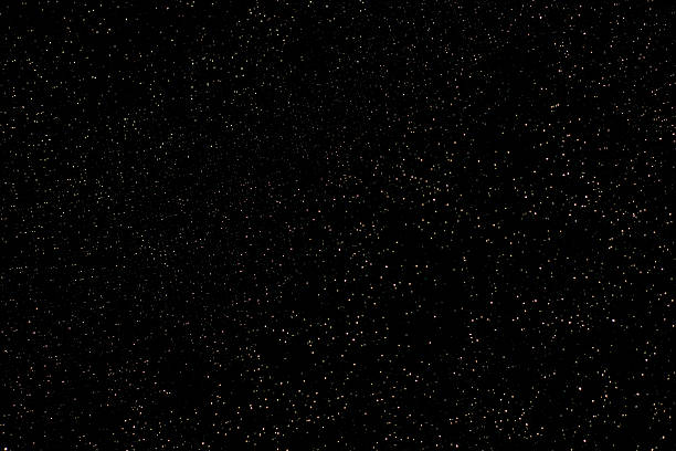 A dense field of stars fills a dark night sky, creating a calm, awe-inspiring cosmic scene.