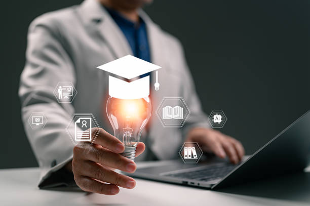 istock Education and Innovation: Business Person Holding Idea Light Bulb 2242687706