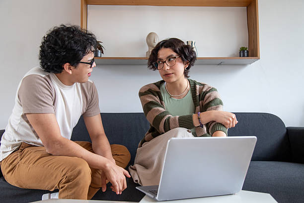 istock two hispanic gen z friends using laptop 2242692758
