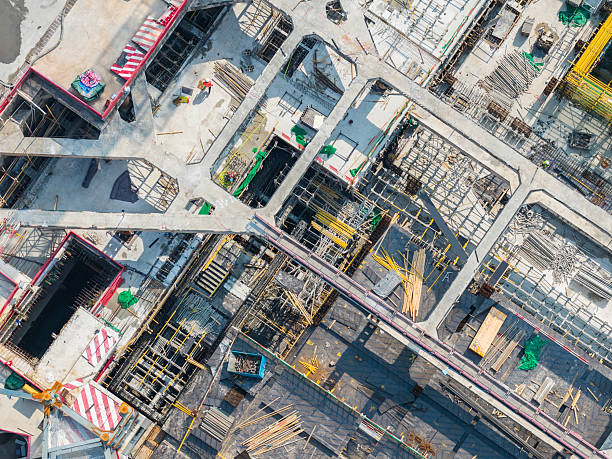 istock Aerial View of a Construction Site with Workers 2242693052
