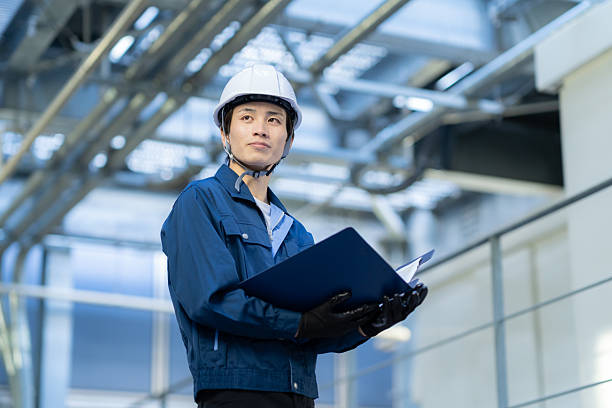 engineer doing maintenance engineer doing maintenance asian male 20s stock pictures, royalty-free photos & images