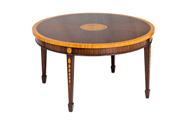 istock Wooden round brown table isolated 2242693546