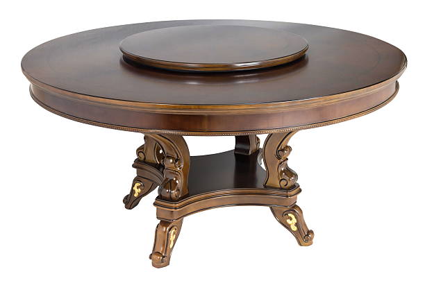 istock Wooden round brown table isolated 2242694427