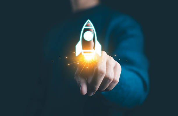 istock Businessman pressing virtual rocket icon with glowing light, symbolizing startup launch, innovation, technology growth, and new business development in the digital era. 2242699995