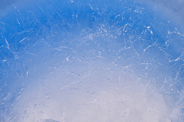 istock Texture of winter ice surface. Blue natural ice background 2242702688