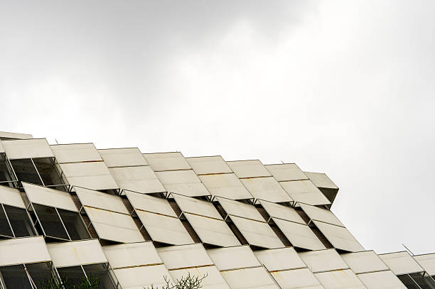 low angle black and white view of office building facades in the city center with characteristic architecture