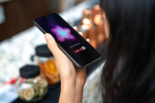 istock A person using AI chatbot on smartphone at cocktail bar counter 2242703690