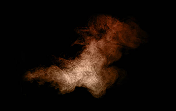 istock Brown smoke or dust cloud isolated on black background, abstract motion texture perfect for visual effects, fire, explosion, or creative design projects needing dynamic atmosphere. 2242703977