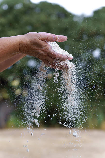 istock Hands sifting flour letting ingredients fall naturally 2242705016