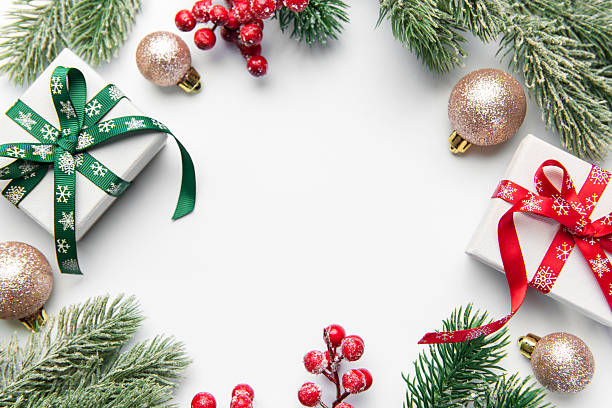 istock Christmas gifts and decorations forming a festive frame 2242715412