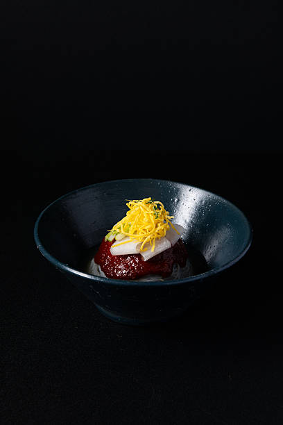 istock Artfully Plated Savory Dish with Yellow Garnish 2242718676
