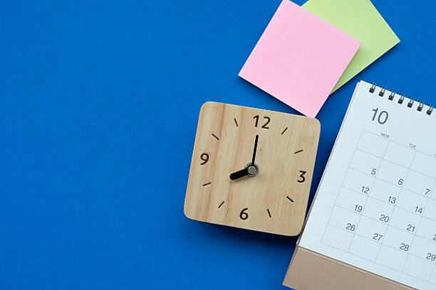 istock close up of calendar on the blue table background, planning for 2242718902