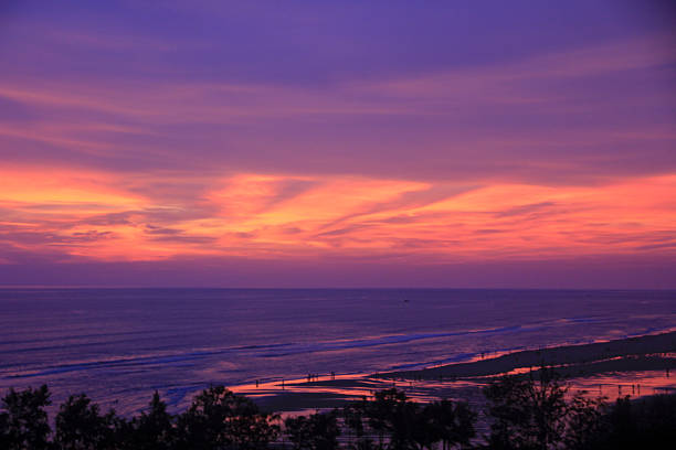 Cox’s Bazar, located in southeastern Bangladesh, is famous for having the world’s longest natural sea beach. Known for its golden sands, turquoise waters, and stunning sunsets, it’s a top destination for tourists seeking relaxation and adventure along the Bay of Bengal