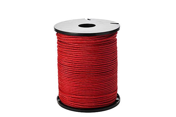 istock Red Rope Spool On Black Plastic Reel, Durable Twisted Cord For Crafts And Ties 2242719086