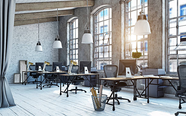 istock Modern industrial loft office workspace. 3d rendering of an empty interior with sunlight from large windows 2242719247