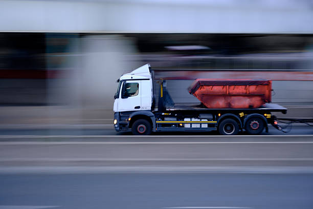 istock Truck driving on urban road 2242723461