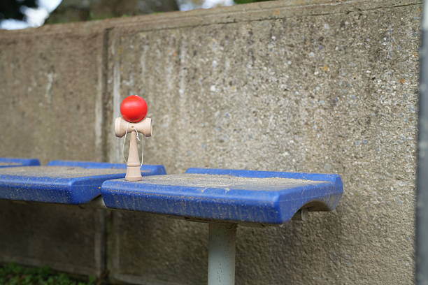istock A red ball sits on a blue bench 2242725495
