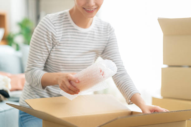 istock woman moving house 2242731982