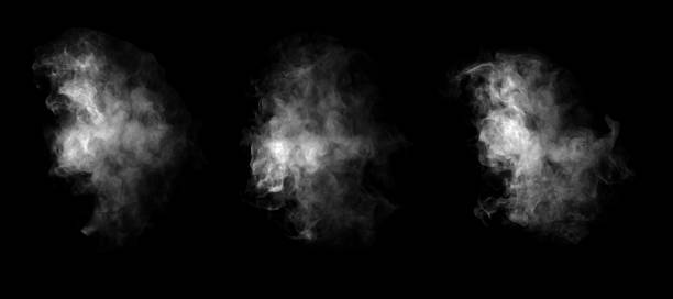 istock White smoke or mist cloud isolated on black background, realistic fog texture effect for photo editing, design overlay, or Halloween theme. Ideal for vapor, steam, or ghostly atmosphere visuals. 2242732321