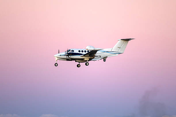 Luqa, Malta - October 8, 2025: Dea Aviation Limited Beechcraft 200T Super King Air (REG: 2-WKTK) landing after sunset.