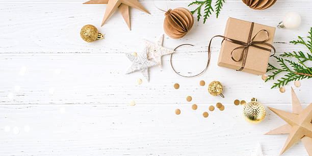 istock Festive Christmas background with gift box and Christmas decorations 2242732470