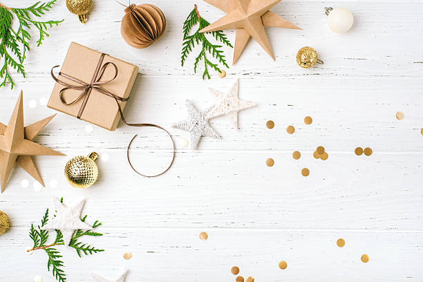 istock Festive Christmas background with gift box and Christmas decorations 2242732497