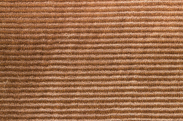 Old velvet jeans background close-up