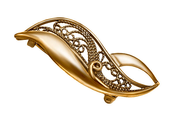 Vinage golden brooch isolated on white background