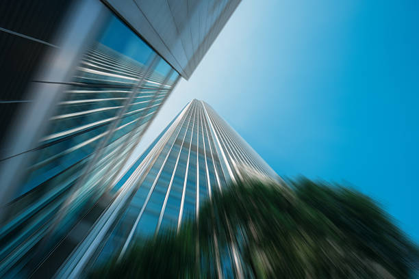 Abstract radial blur captures Hong Kong architectures soaring skyward. A dynamic view with blurred details.