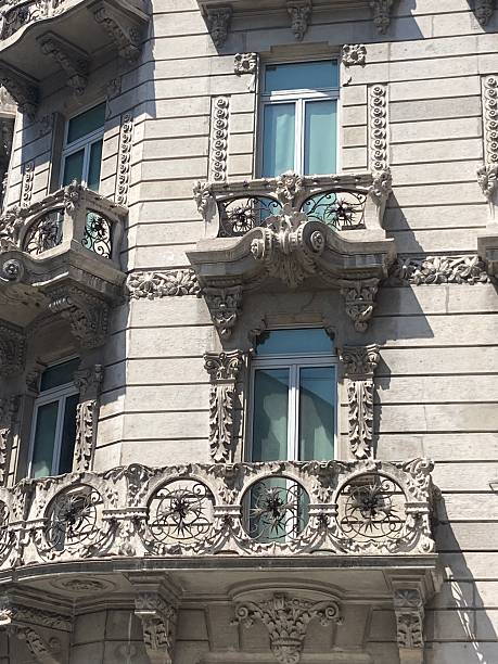 istock Elegant Stone Trimmed Windows from Historic Buildings – High-Resolution Architectural Photography 2242748692