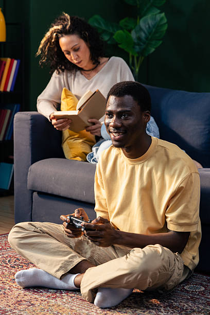 istock Diverse couple spending leisure time at home 2242749124