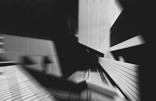 istock An abstract image featuring Hong Kong architectures, enhanced with a radial blur effect. The monochrome photo displays geometric shapes and shadows. 2242749125