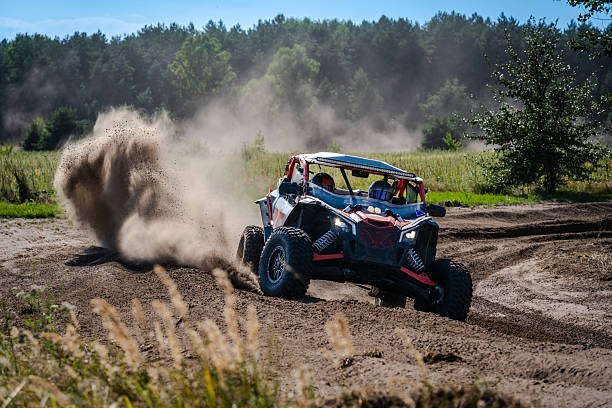 istock Cool view on UTV, rally, 4x4 riding in dusty track. Amateur competitions 2242750445