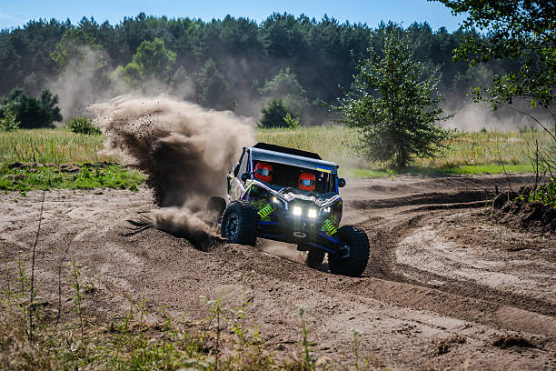 istock Cool view on UTV, rally, 4x4 riding in dusty track. Amateur competitions 2242750446