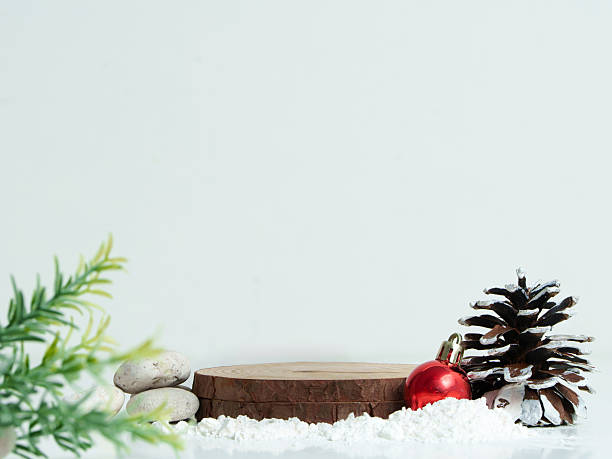 Winter-themed background with natural elements and festive decorations.
