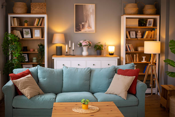 istock Living room sofa with warm lighting creating cozy atmosphere 2242759232