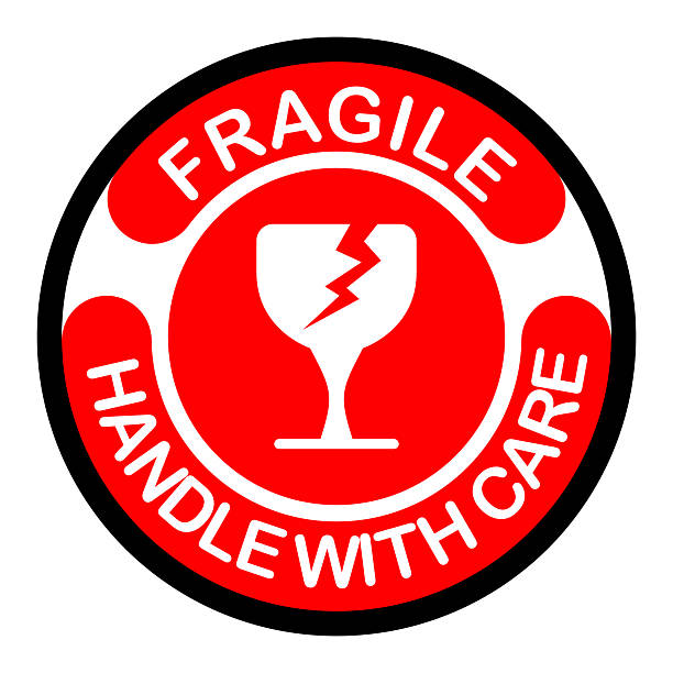 istock Bold fragile sticker with broken glass icon and warning text, perfect for packaging labels, shipping safety, and product handling instructions. 2242759233