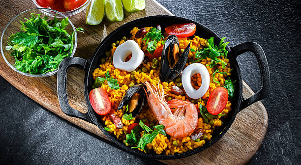 istock Seafood paella served in a cast iron pan 2242762706