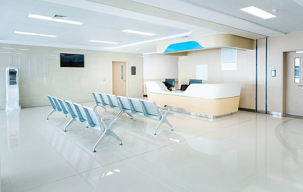 istock Hospital waiting room with many empty chairs 2242763996