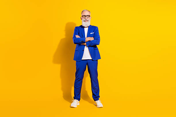 istock Full length body size view of nice chic classy cheerful man folded arms isolated over bright yellow color background 2242764743