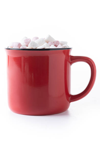 istock Hot chocolate with marshmallows in red mug 2242765779