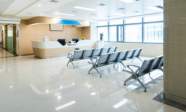 istock Hospital waiting room with many empty chairs 2242766348