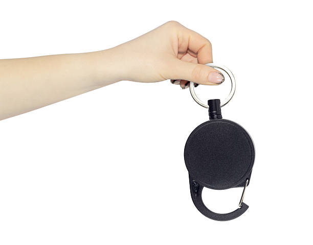 Vintage key holder and keys on red background with space for text.