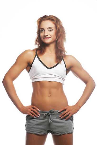 picture of beautiful sporty muscular woman isolated on white